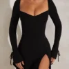 Robe A-line à manches longues Amryn en noir Robe A-line à manches longues Amryn en noir