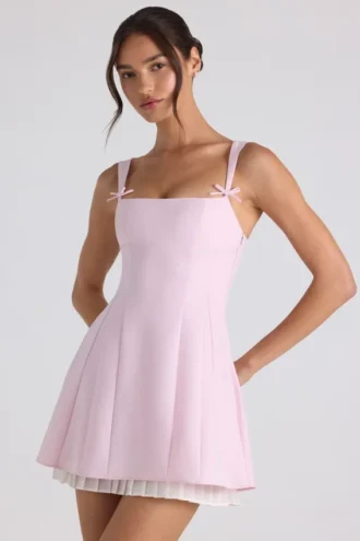 Robe A-line plissée avec nœud Cressida, rose pâle