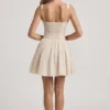 Robe A-line Sabina en broderie anglaise avec nœud, couleur ivoire Robe A-line Sabina en broderie anglaise avec nœud, couleur ivoire