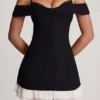 Robe A-line à volants et épaules dénudées Maelie en noir Robe A-line à volants et épaules dénudées Maelie en noir