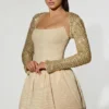 Robe Aletta à ourlet bouffant orné de paillettes dorées Robe Aletta à ourlet bouffant orné de paillettes dorées