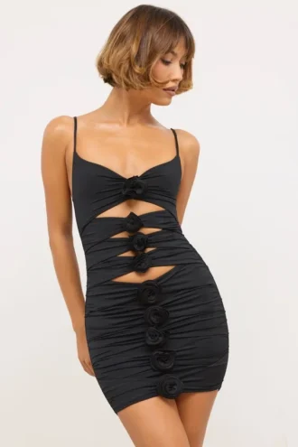 Robe Aniela en jersey fluide avec détails roses et découpes, couleur noir