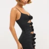 Robe Aniela en jersey fluide avec détails roses et découpes, couleur noir Robe Aniela en jersey fluide avec détails roses et découpes, couleur noir