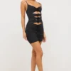 Robe Aniela en jersey fluide avec détails roses et découpes, couleur noir Robe Aniela en jersey fluide avec détails roses et découpes, couleur noir