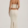 Robe corset drapée à découpes ornées Saphira en blanc Robe corset drapée à découpes ornées Saphira en blanc