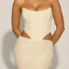 Robe corset drapée à découpes ornées Saphira en blanc Robe corset drapée à découpes ornées Saphira en blanc