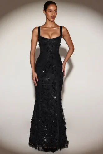 Robe corset à encolure dégagée et appliqués décoratifs Vasanta, en noir