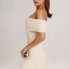Robe courte asymétrique en modal Suhana, coupe trapèze, couleur ivoire Robe courte asymétrique en modal Suhana, coupe trapèze, couleur ivoire