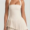 Robe courte asymétrique à volants et dos nu Rosaria, couleur ivoire Robe courte asymétrique à volants et dos nu Rosaria, couleur ivoire