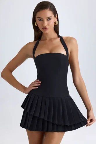 Robe courte asymétrique à volants et dos nu Rosaria en noir