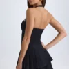 Robe courte asymétrique à volants et dos nu Rosaria en noir Robe courte asymétrique à volants et dos nu Rosaria en noir