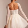 Robe courte Calliope à manches longues et jupe en tulle ornée, couleur ivoire Robe courte Calliope à manches longues et jupe en tulle ornée, couleur ivoire