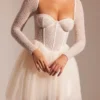 Robe courte Calliope à manches longues et jupe en tulle ornée, couleur ivoire Robe courte Calliope à manches longues et jupe en tulle ornée, couleur ivoire
