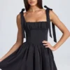 Robe courte à corset drapé Bellamy en noir Robe courte à corset drapé Bellamy en noir