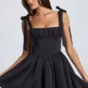Robe courte à corset drapé Bellamy en noir Robe courte à corset drapé Bellamy en noir