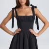 Robe courte à corset drapé Bellamy en noir Robe courte à corset drapé Bellamy en noir