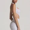 Robe courte dos nu à découpes ornées Lucia en blanc Robe courte dos nu à découpes ornées Lucia en blanc
