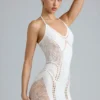 Robe courte dos nu Tori avec ornements, couleur ivoire Robe courte dos nu Tori avec ornements, couleur ivoire