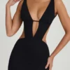 Robe courte Gaia à découpes et coupe trapèze, en noir Robe courte Gaia à découpes et coupe trapèze, en noir