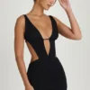 Robe courte Gaia à découpes et coupe trapèze, en noir Robe courte Gaia à découpes et coupe trapèze, en noir