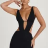 Robe courte Gaia à découpes et coupe trapèze, en noir Robe courte Gaia à découpes et coupe trapèze, en noir