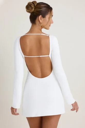 Robe courte à manches longues et découpes Mavisa en blanc