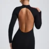 Robe courte à manches longues et dos nu Yara en modal noir Robe courte à manches longues et dos nu Yara en modal noir