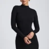 Robe courte à manches longues et dos nu Yara en modal noir Robe courte à manches longues et dos nu Yara en modal noir