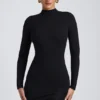 Robe courte à manches longues et dos nu Yara en modal noir Robe courte à manches longues et dos nu Yara en modal noir