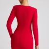 Robe courte à manches longues Luciana avec découpe en forme de cœur, couleur rouge feu Robe courte à manches longues Luciana avec découpe en forme de cœur, couleur rouge feu