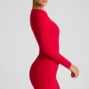 Robe courte à manches longues Luciana avec découpe en forme de cœur, couleur rouge feu Robe courte à manches longues Luciana avec découpe en forme de cœur, couleur rouge feu