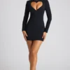 Robe courte à manches longues Luciana avec découpe en forme de cœur, en noir Robe courte à manches longues Luciana avec découpe en forme de cœur, en noir