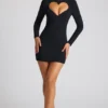 Robe courte à manches longues Luciana avec découpe en forme de cœur, en noir Robe courte à manches longues Luciana avec découpe en forme de cœur, en noir