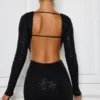 Robe courte Marva à découpes et ornements, en noir Robe courte Marva à découpes et ornements, en noir