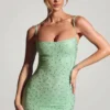 Robe courte moulante Aellin avec ornements, couleur pistache Robe courte moulante Aellin avec ornements, couleur pistache
