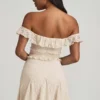 Robe courte Nahida à épaules dénudées et coupe trapèze en dentelle ivoire Robe courte Nahida à épaules dénudées et coupe trapèze en dentelle ivoire