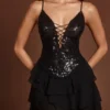 Robe courte Ottavia à volants et lacets, ornée de paillettes, motif zèbre noir Robe courte Ottavia à volants et lacets, ornée de paillettes, motif zèbre noir