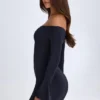 Robe courte à épaules dénudées et découpes Madelina en noir Robe courte à épaules dénudées et découpes Madelina en noir
