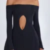 Robe courte à épaules dénudées et découpes Madelina en noir Robe courte à épaules dénudées et découpes Madelina en noir