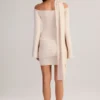 Robe courte à épaules dénudées Luzia avec détails en tricot, couleur crème Robe courte à épaules dénudées Luzia avec détails en tricot, couleur crème