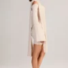 Robe courte à épaules dénudées Luzia avec détails en tricot, couleur crème Robe courte à épaules dénudées Luzia avec détails en tricot, couleur crème