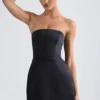 Robe courte tulipe structurée à bandeau Haisley en noir Robe courte tulipe structurée à bandeau Haisley en noir