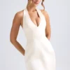 Robe courte tulipe structurée à dos nu Harmonia, couleur ivoire Robe courte tulipe structurée à dos nu Harmonia, couleur ivoire