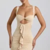 Robe courte Zivanka en jersey fluide avec découpes et bordure à volants, couleur crème