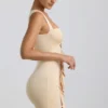 Robe courte Zivanka en jersey fluide avec découpes et bordure à volants, couleur crème