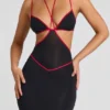 Robe de soirée Bella à découpes et bordures contrastées, en noir Robe de soirée Bella à découpes et bordures contrastées, en noir