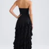 Robe de soirée sans bretelles Diletta à volants, en noir Robe de soirée sans bretelles Diletta à volants, en noir