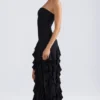 Robe de soirée sans bretelles Diletta à volants, en noir Robe de soirée sans bretelles Diletta à volants, en noir