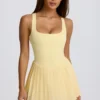 Robe de tennis plissée Soft Active à dos nu, couleur citron Robe de tennis plissée Soft Active à dos nu, couleur citron