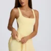 Robe de tennis plissée Soft Active à dos nu, couleur citron Robe de tennis plissée Soft Active à dos nu, couleur citron